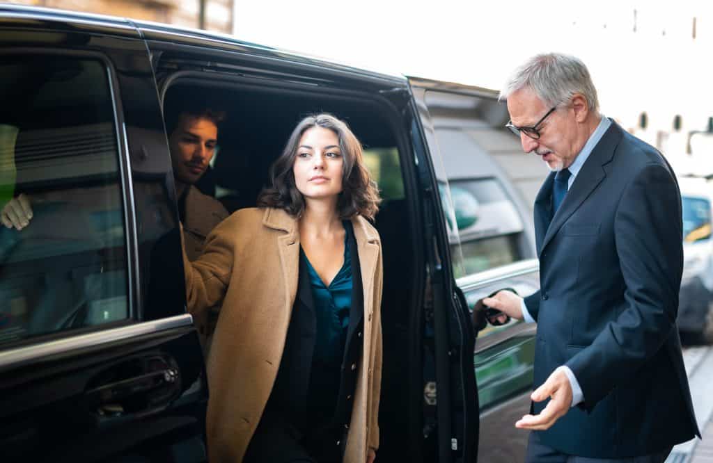 Passengers using a reliable shuttle transfer service with Eurotaxis, enjoying comfortable and convenient transport to their destination with professional drivers and spacious vehicles.